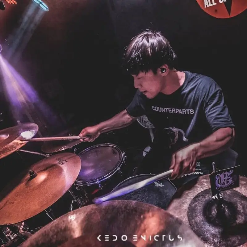 End These Days member Wookwon