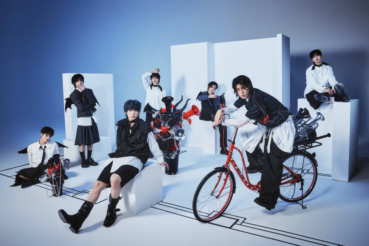 NEXZ members are Tomoya, Yu, Haru, So Geon, Seita, Hyui, and Yuki.