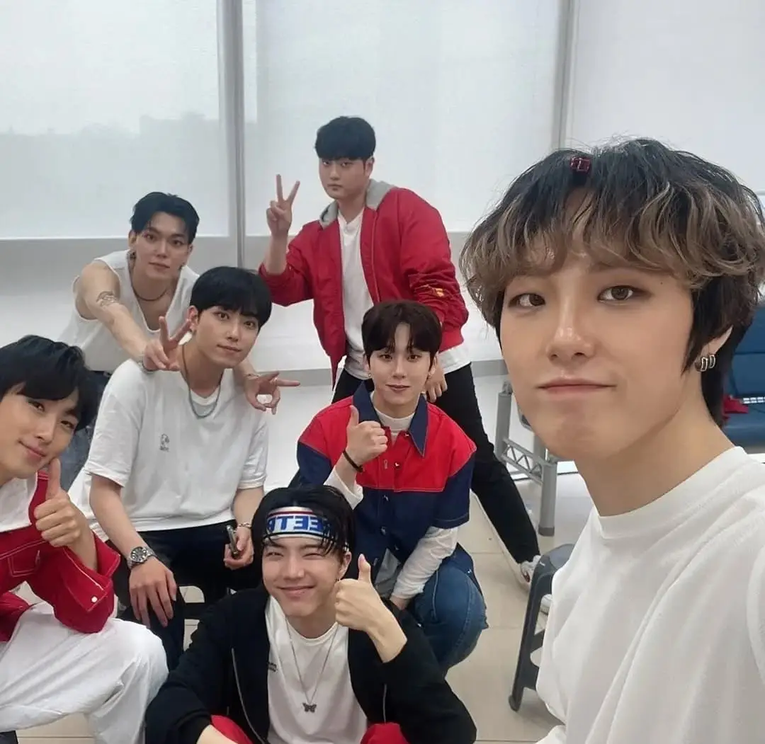 URSA MAJOR members are Woonyul, Minsung, Junhyun, KiKO, Bel, Yejoon, and Seunghyuk.