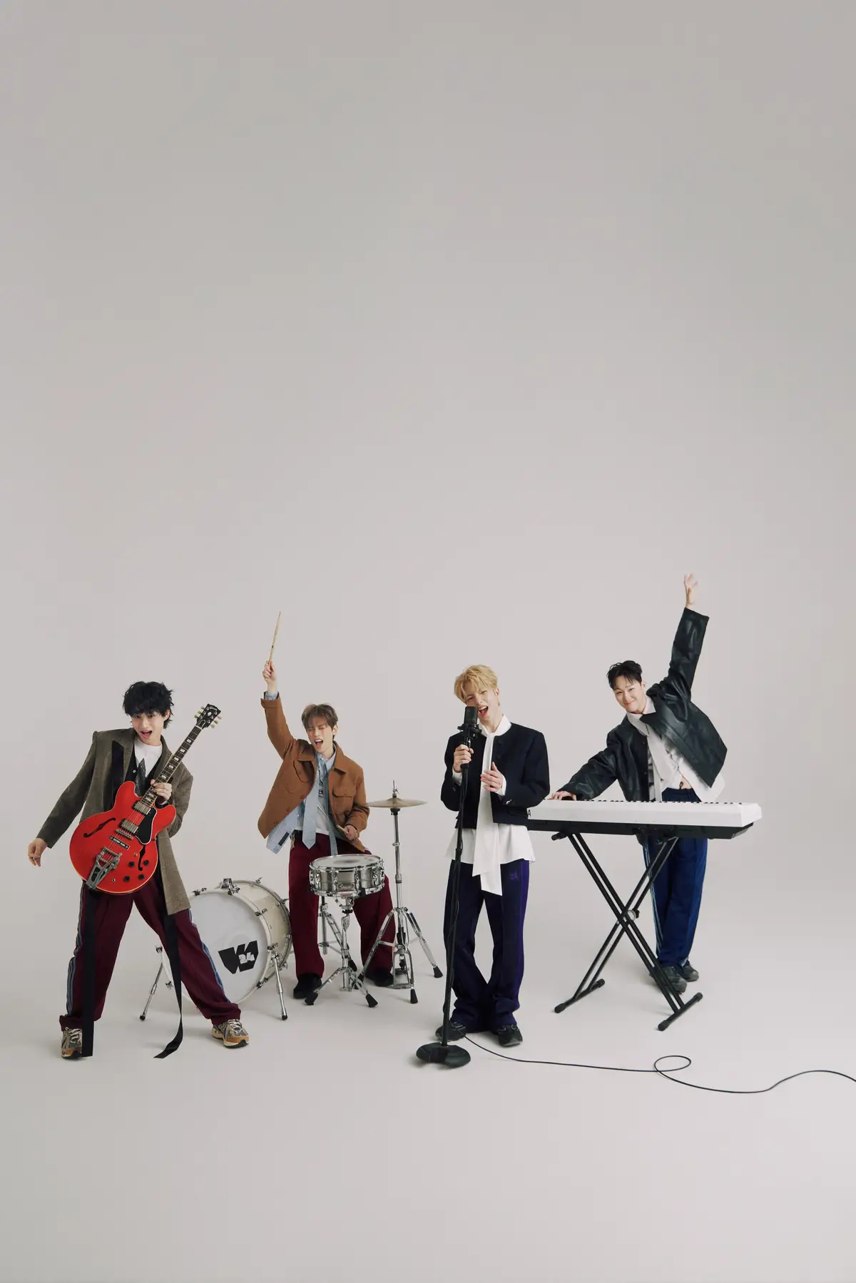 W24 members are Howon, Jonggil, Aaron, and Yunsoo.